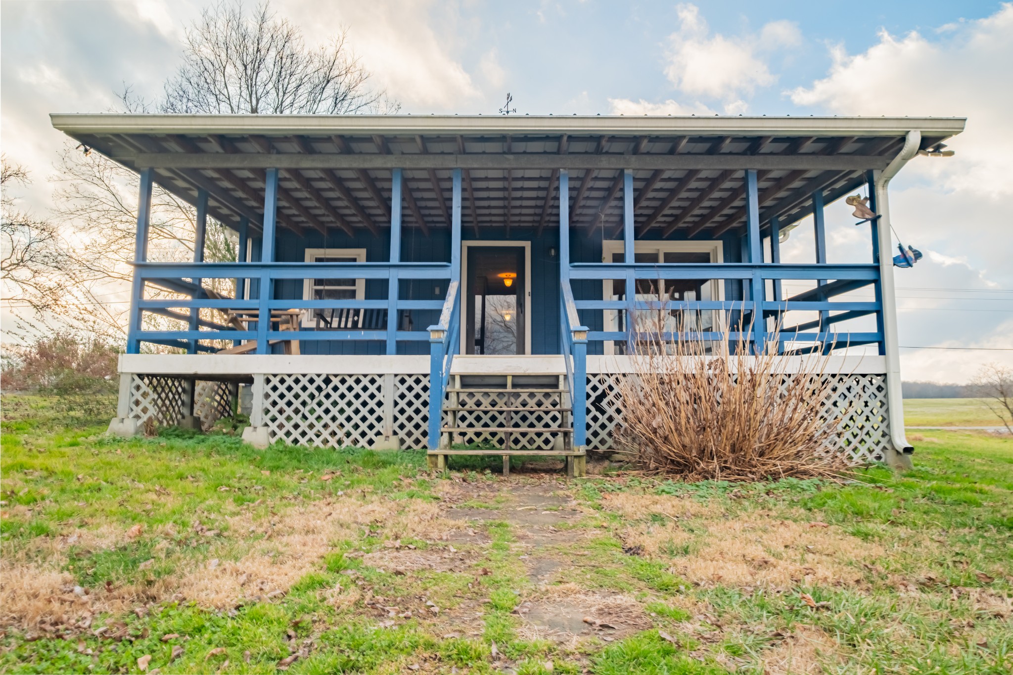 3324 Fredonia Road Manchester, TN 37355 - Photo 9 of 42 a front view of a house with wooden fence