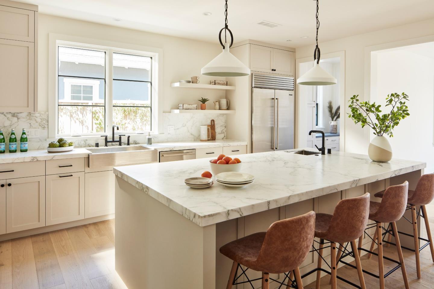 2113 Cully Place San Jose, CA 95124 - Photo 7 of 41 a kitchen with kitchen island a dining table and a sink