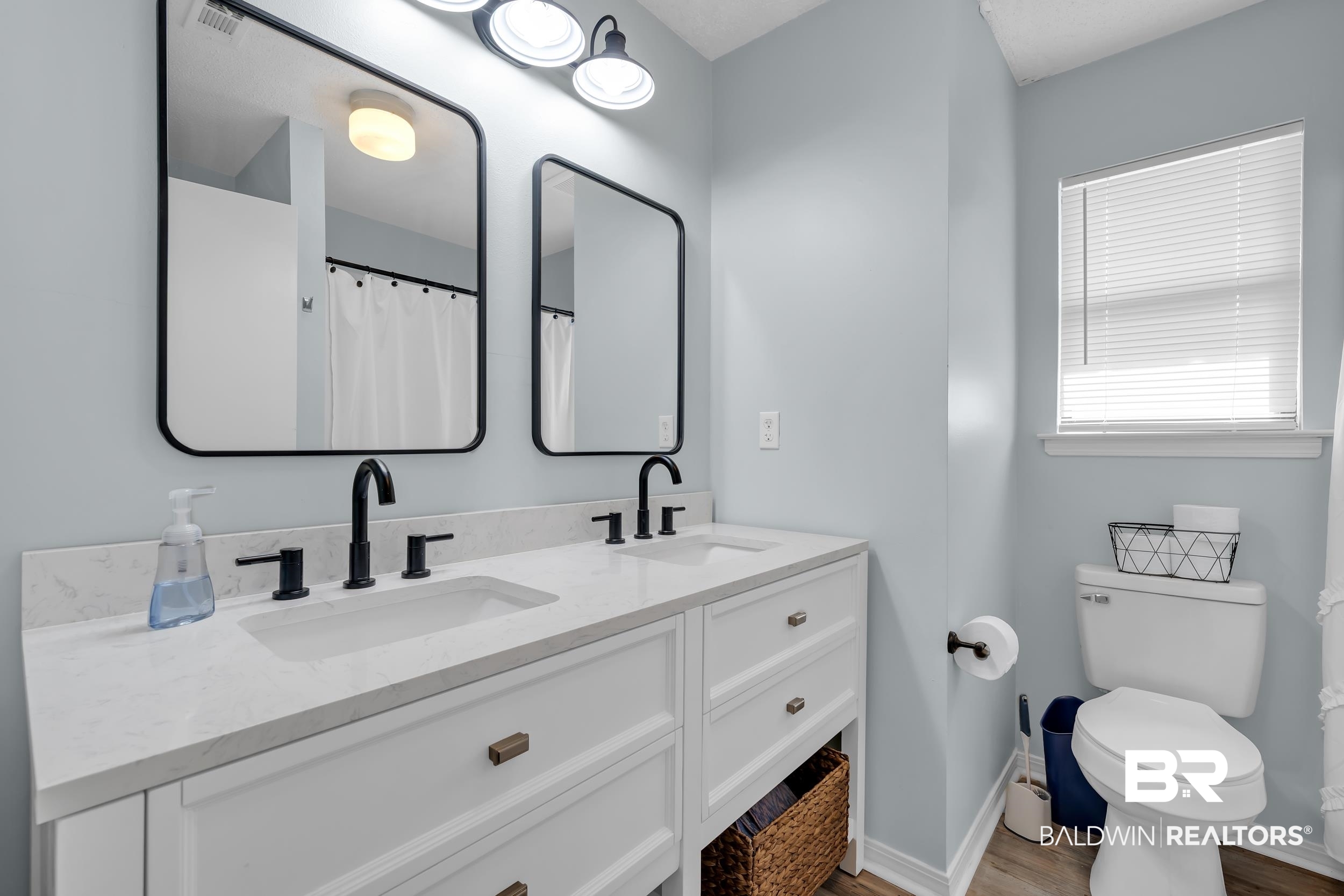 8081 Bryant's Lndg Road Stockton, AL 36579 - Photo 33 of 48 Full bath featuring double vanity and light wood-style flooring
