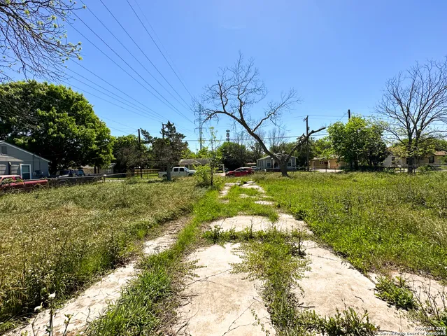 a view of a garden with an outdoor space