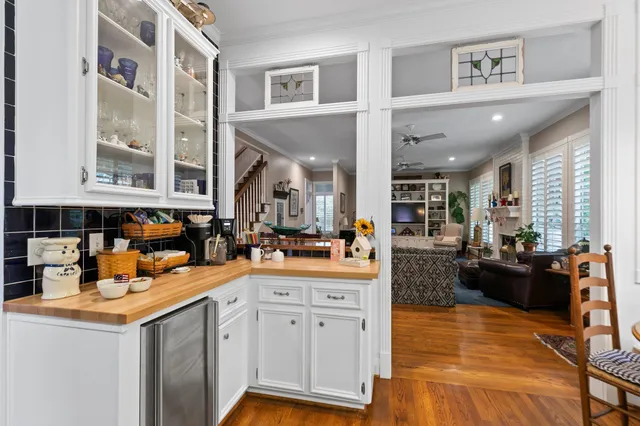 a kitchen with stainless steel appliances granite countertop a sink and cabinets