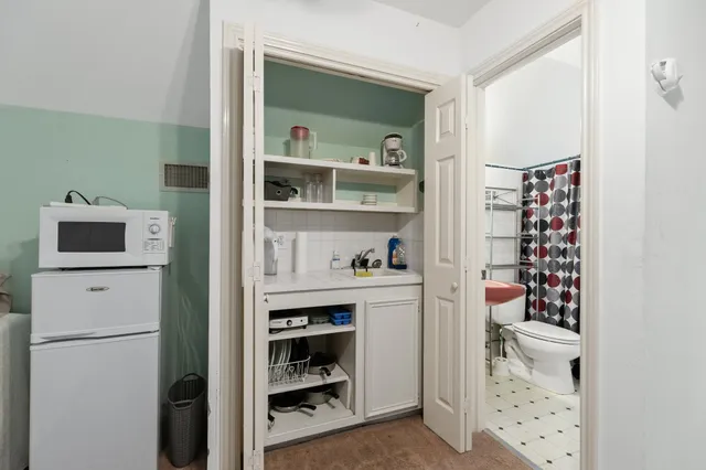 a room with storage and utility