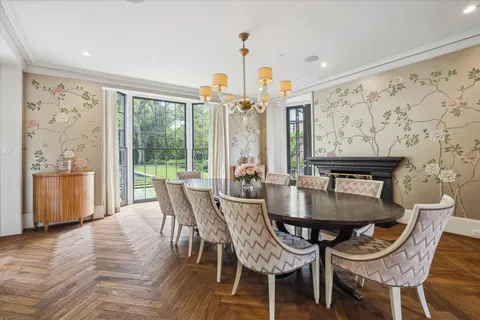a view of a dining room with furniture window and outside view