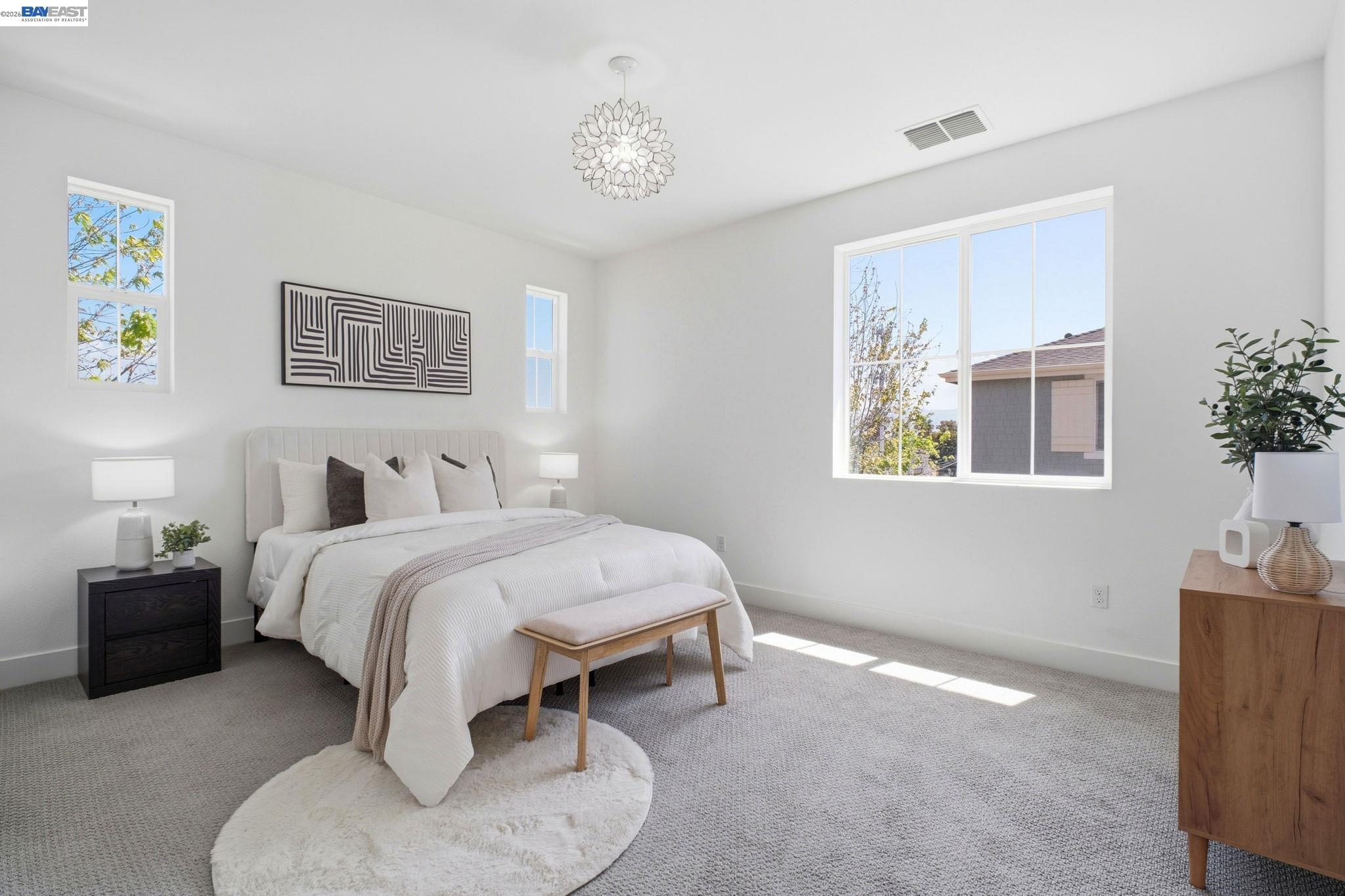 37784 Taro Terrace Newark, CA 94560 - Photo 12 of 20 a bed room with a bed and a lamp