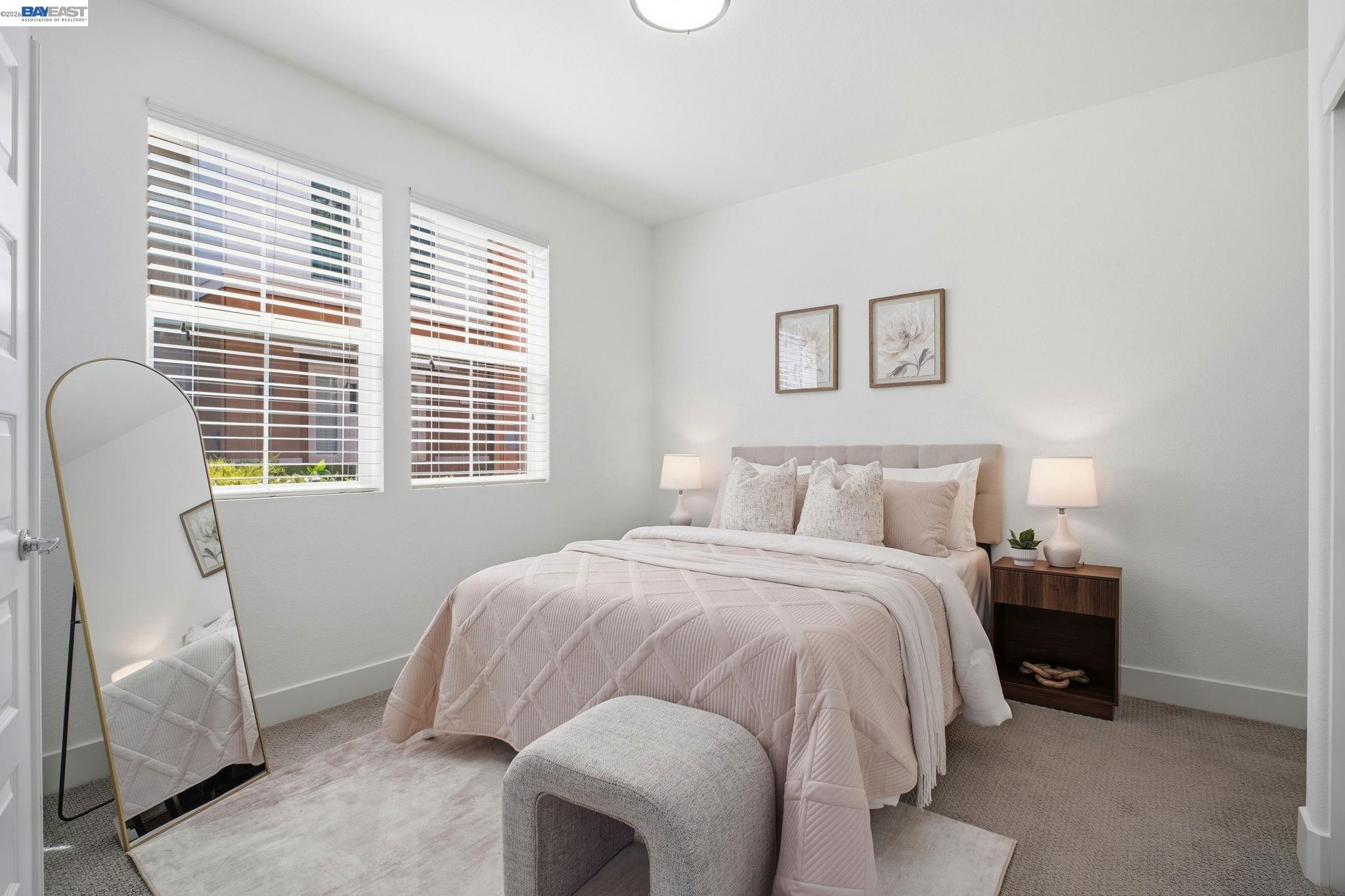 37784 Taro Terrace Newark, CA 94560 - Photo 13 of 20 a bedroom with a bed and a chair