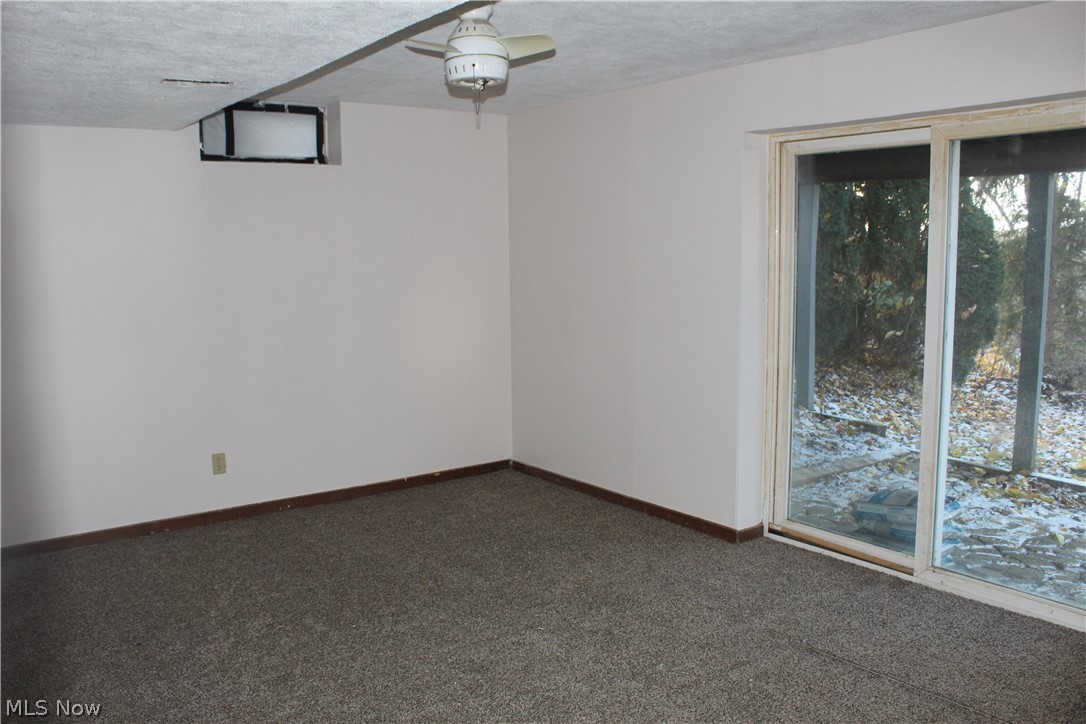 526 Gibbs Road Akron, OH 44312 - Photo 10 of 22 Walk-out basement family room