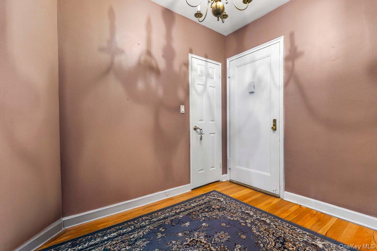 2 Overlook Road, Unit 1B7A White Plains, NY 10605 - Photo 10 of 18 a view of a hallway with wooden floor