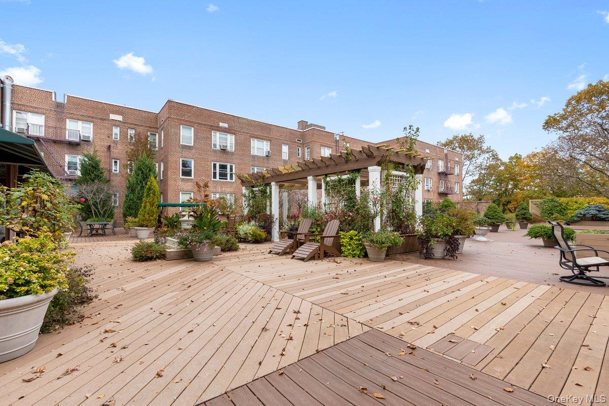 2 Overlook Road, Unit 1B7A White Plains, NY 10605 - Photo 12 of 18 a view of a house with sitting area and covered with wooden floor