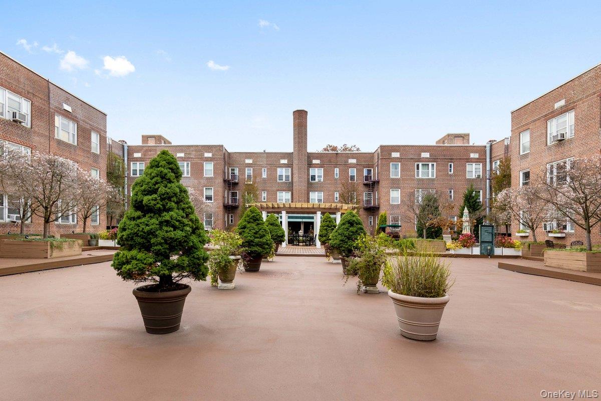 2 Overlook Road, Unit 1B7A White Plains, NY 10605 - Photo 14 of 18 a view of a street with potted plants