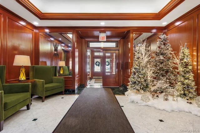a view of livingroom with furniture and staircase