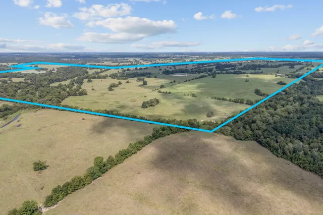 a view of a street with an ocean view