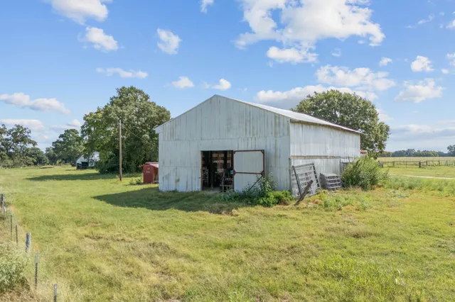a house view with garden space