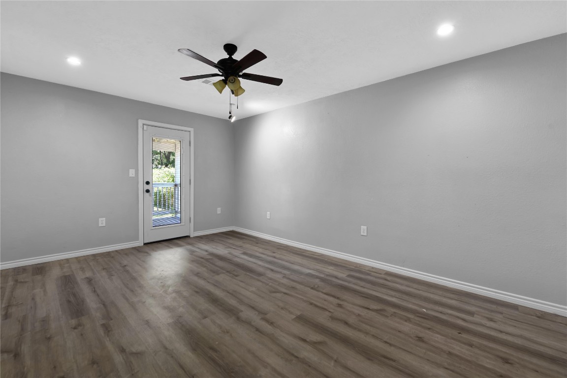 206 Miller Road Livingston, TX 77351 - Photo 13 of 27 Primary Bedroom. Door going to back porch.
