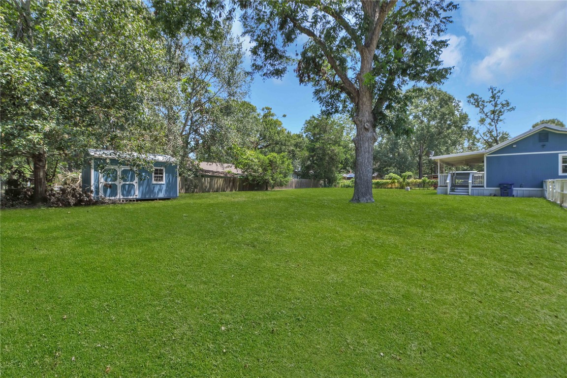 206 Miller Road Livingston, TX 77351 - Photo 24 of 27 Extra lot with storage building.