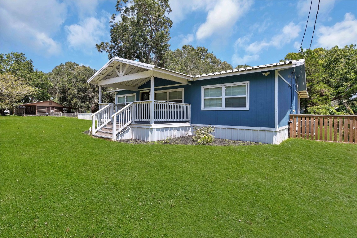 206 Miller Road Livingston, TX 77351 - Photo 3 of 27 Right side view of the home.