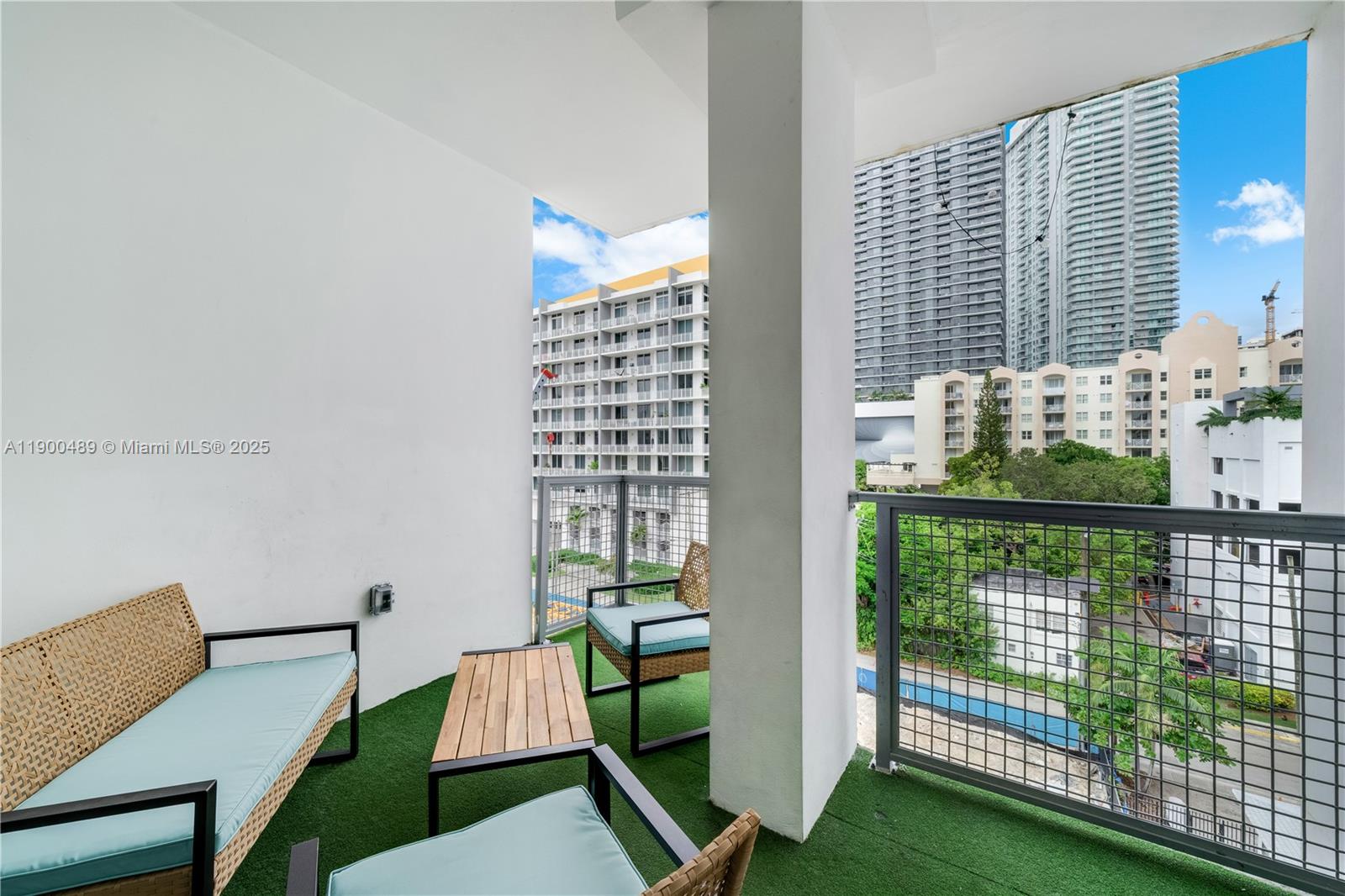 481 Northeast 29th Street, Unit 601 Miami, FL 33137 - Photo 3 of 23 a view of workspace with wooden floor