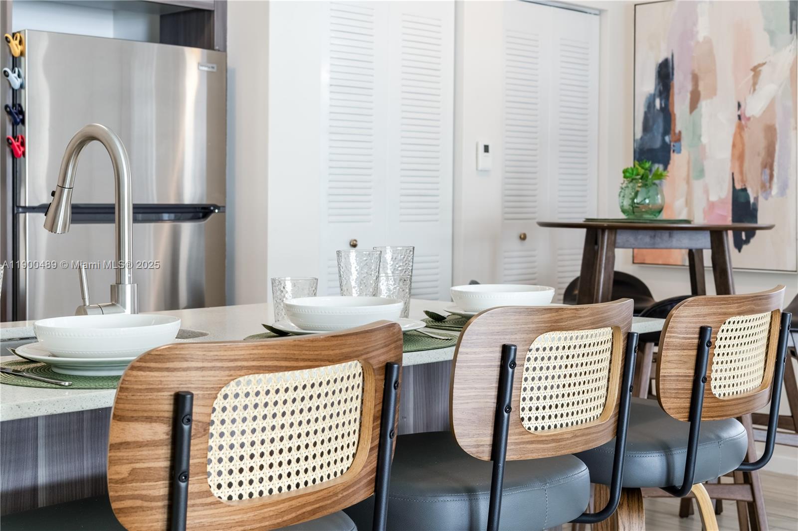 481 Northeast 29th Street, Unit 601 Miami, FL 33137 - Photo 5 of 23 a dining room with furniture and window