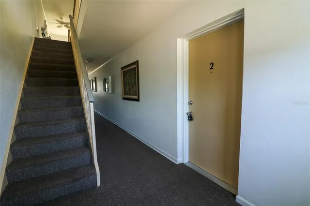 a view of a kitchen with wooden floor