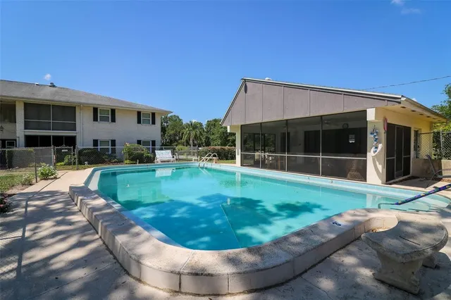 a view of a park with large trees