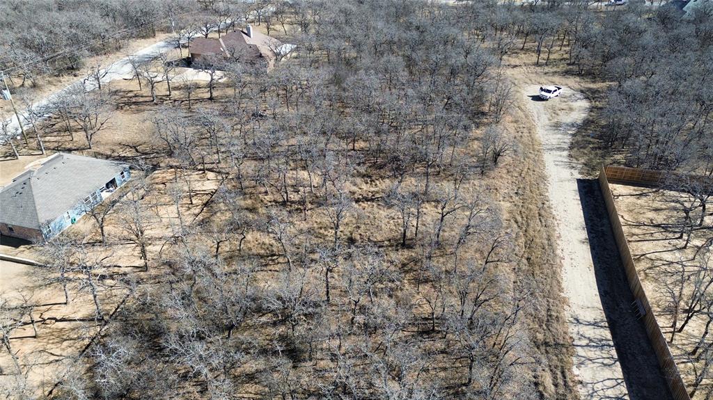 0 Comewell Court Runaway Bay, TX 76426 - Photo 5 of 5 a view of a pathway with a yard