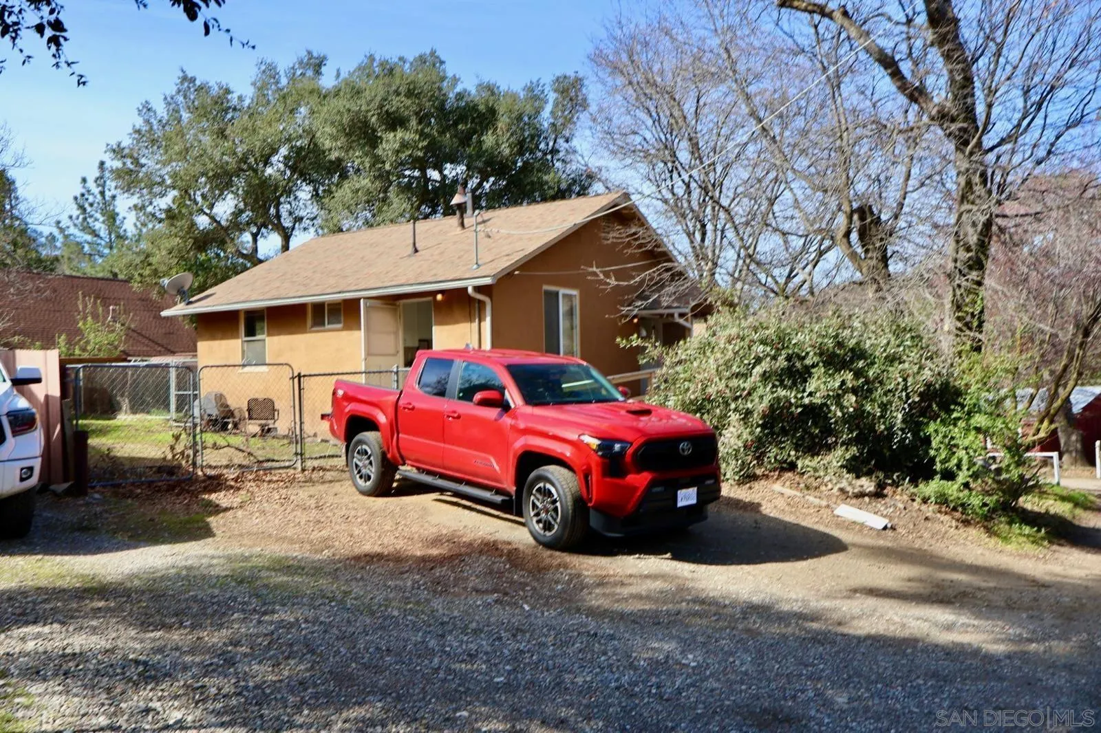 1273 Ridge Trail Julian, CA 92036 - Photo 2 of 33 a car parked in front of a house