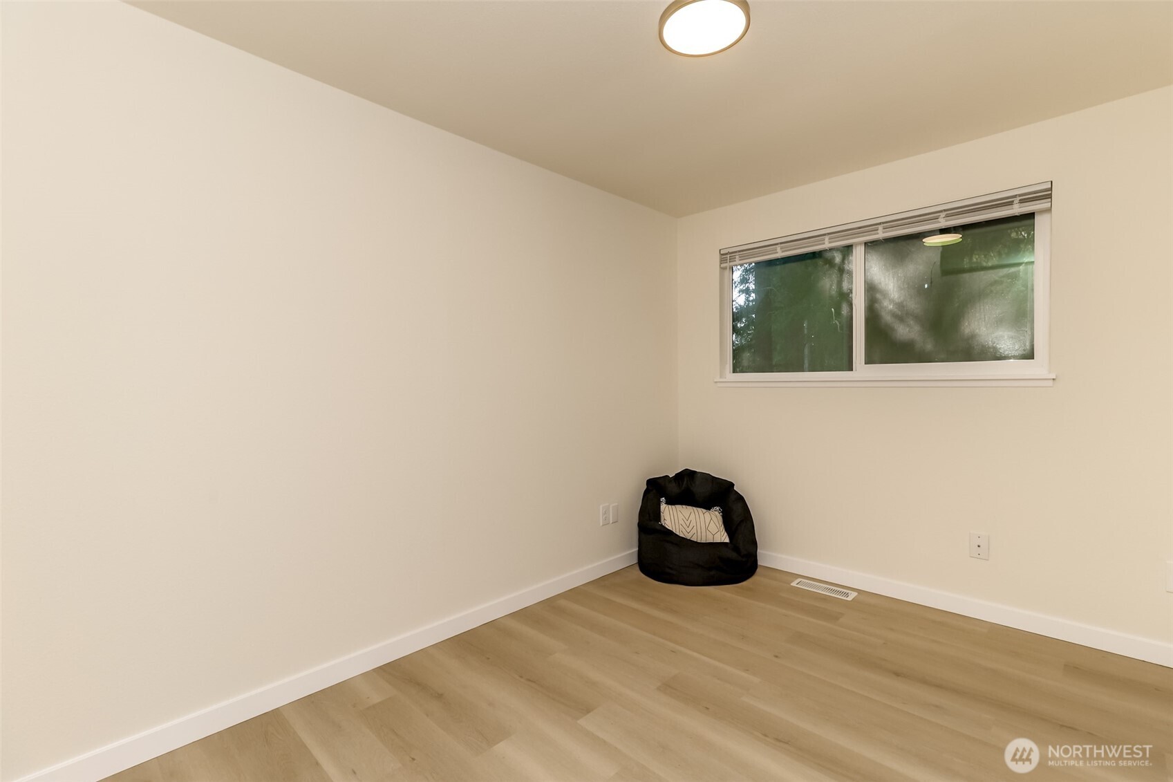 2727 South 357th Place Federal Way, WA 98003 - Photo 16 of 24 a view of a closet with wooden floor
