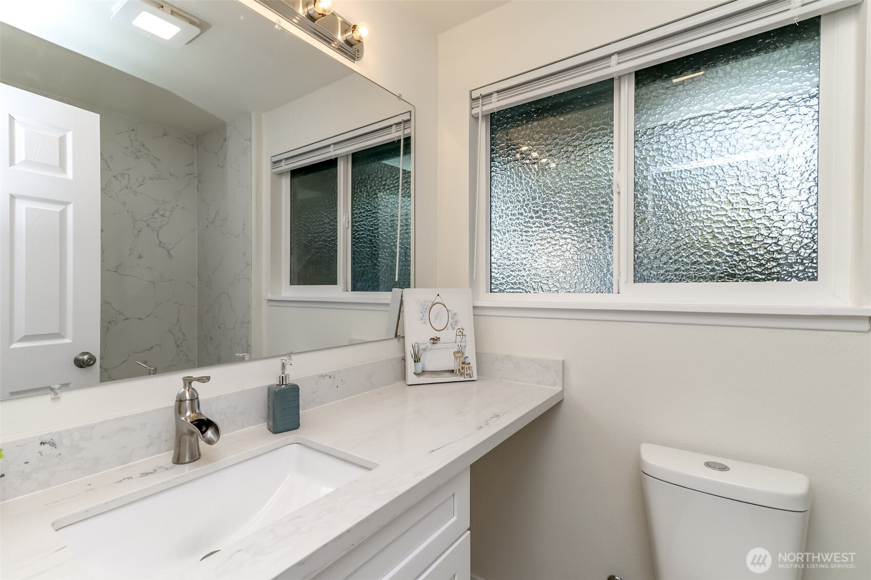 2727 South 357th Place Federal Way, WA 98003 - Photo 19 of 24 a bathroom with a sink and a toilet