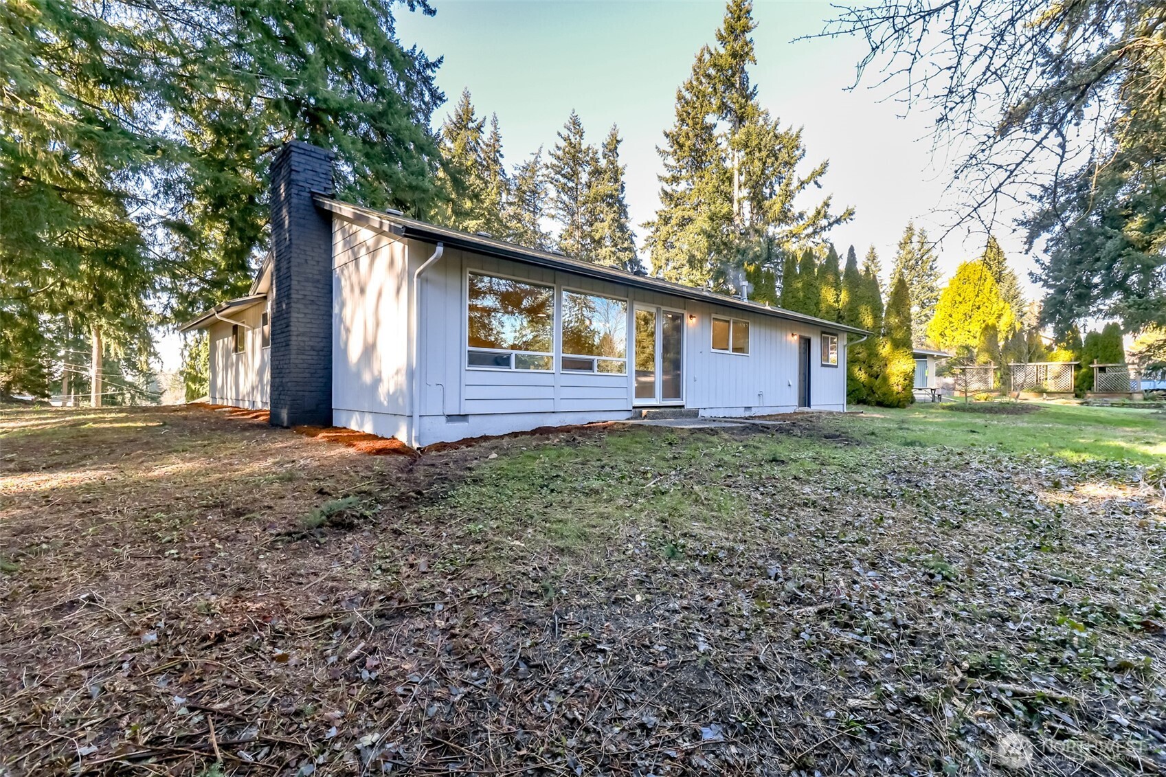 2727 South 357th Place Federal Way, WA 98003 - Photo 22 of 24 a view of a house with a yard