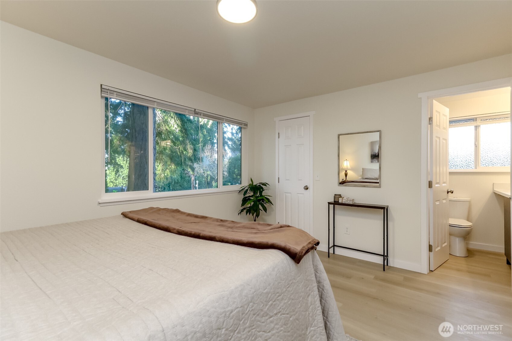 2727 South 357th Place Federal Way, WA 98003 - Photo 10 of 24 a bedroom with a bed and a table