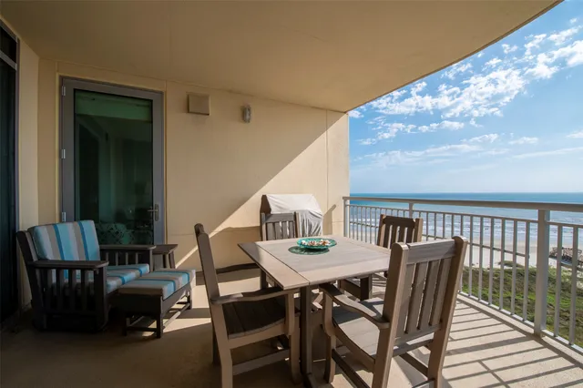 a view of balcony with furniture and outdoor space