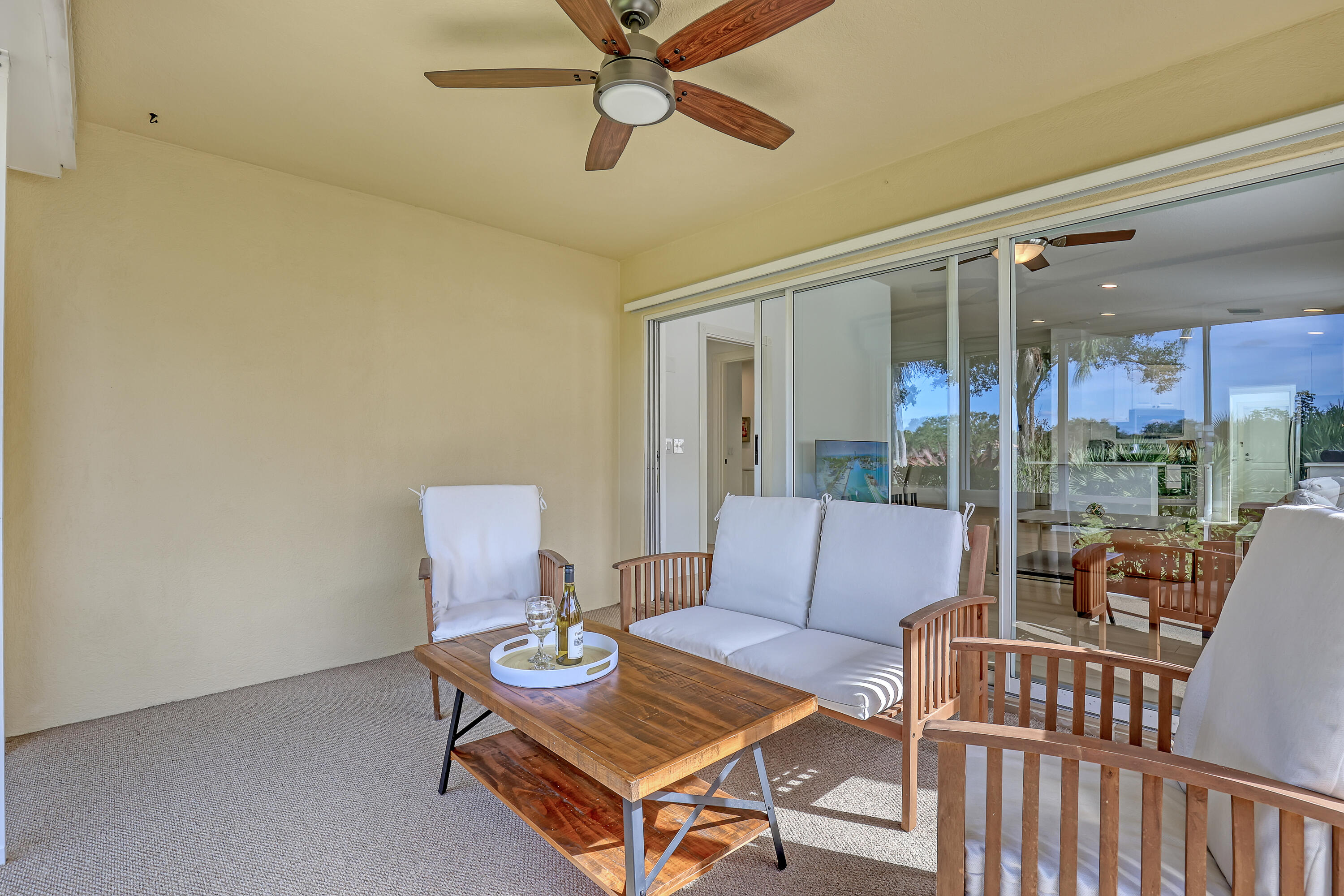 907 Southwest Balmoral Trace Stuart, FL 34997 - Photo 27 of 46 a living room with furniture and a window