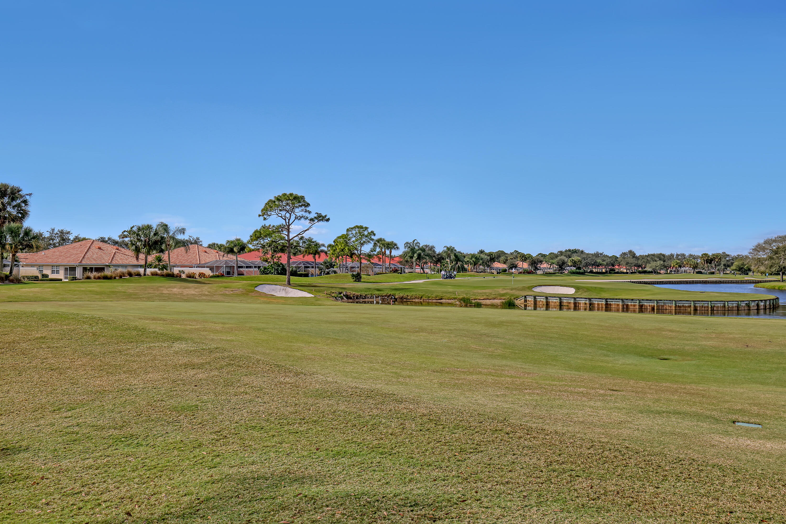 907 Southwest Balmoral Trace Stuart, FL 34997 - Photo 30 of 46 a view of an ocean with a nearby beach