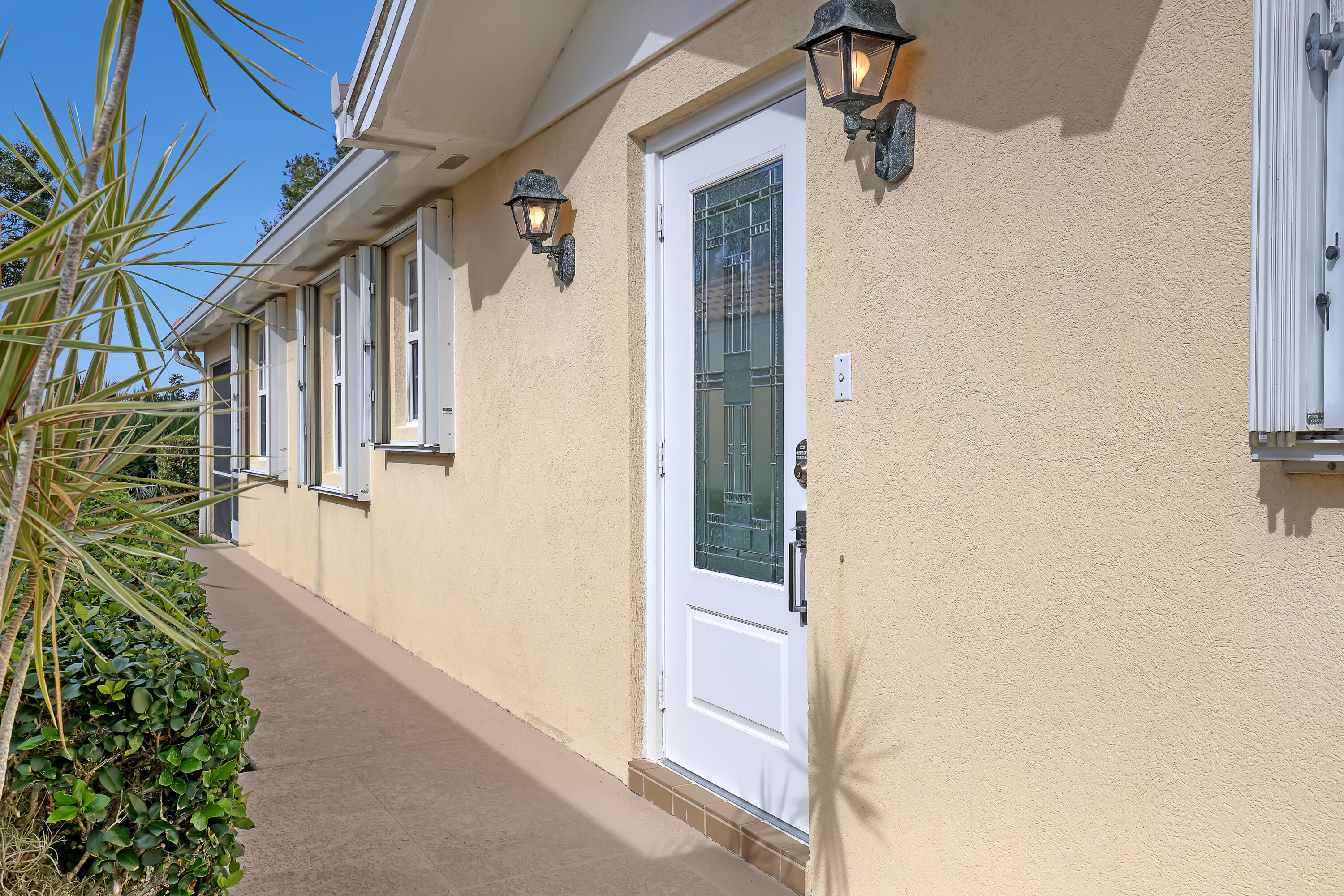 907 Southwest Balmoral Trace Stuart, FL 34997 - Photo 32 of 46 front entryway with impact door.