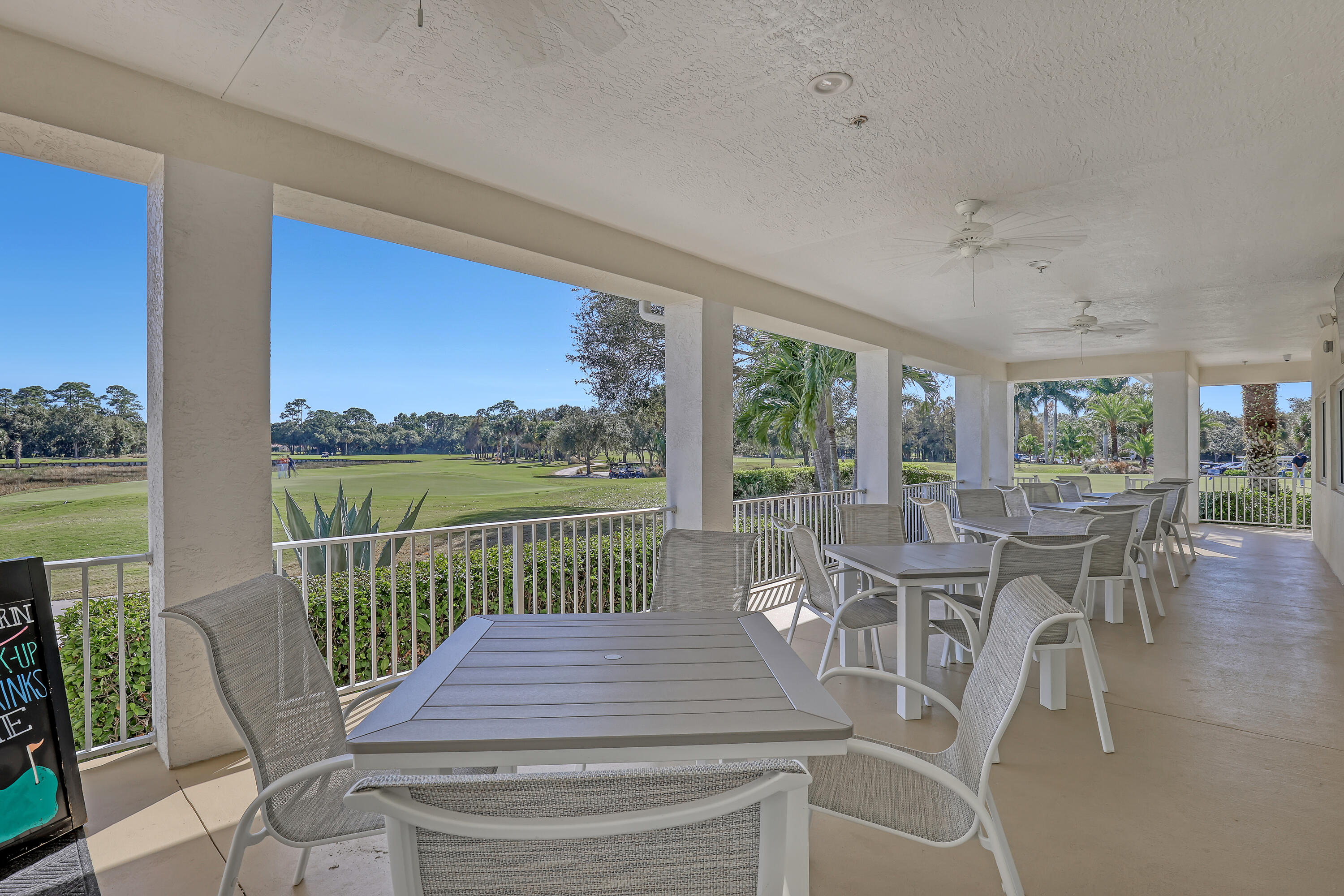 907 Southwest Balmoral Trace Stuart, FL 34997 - Photo 43 of 46 a view of a dining room with furniture window and outside view