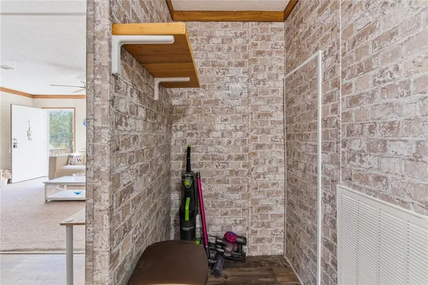 a bathroom with a shower and a sink