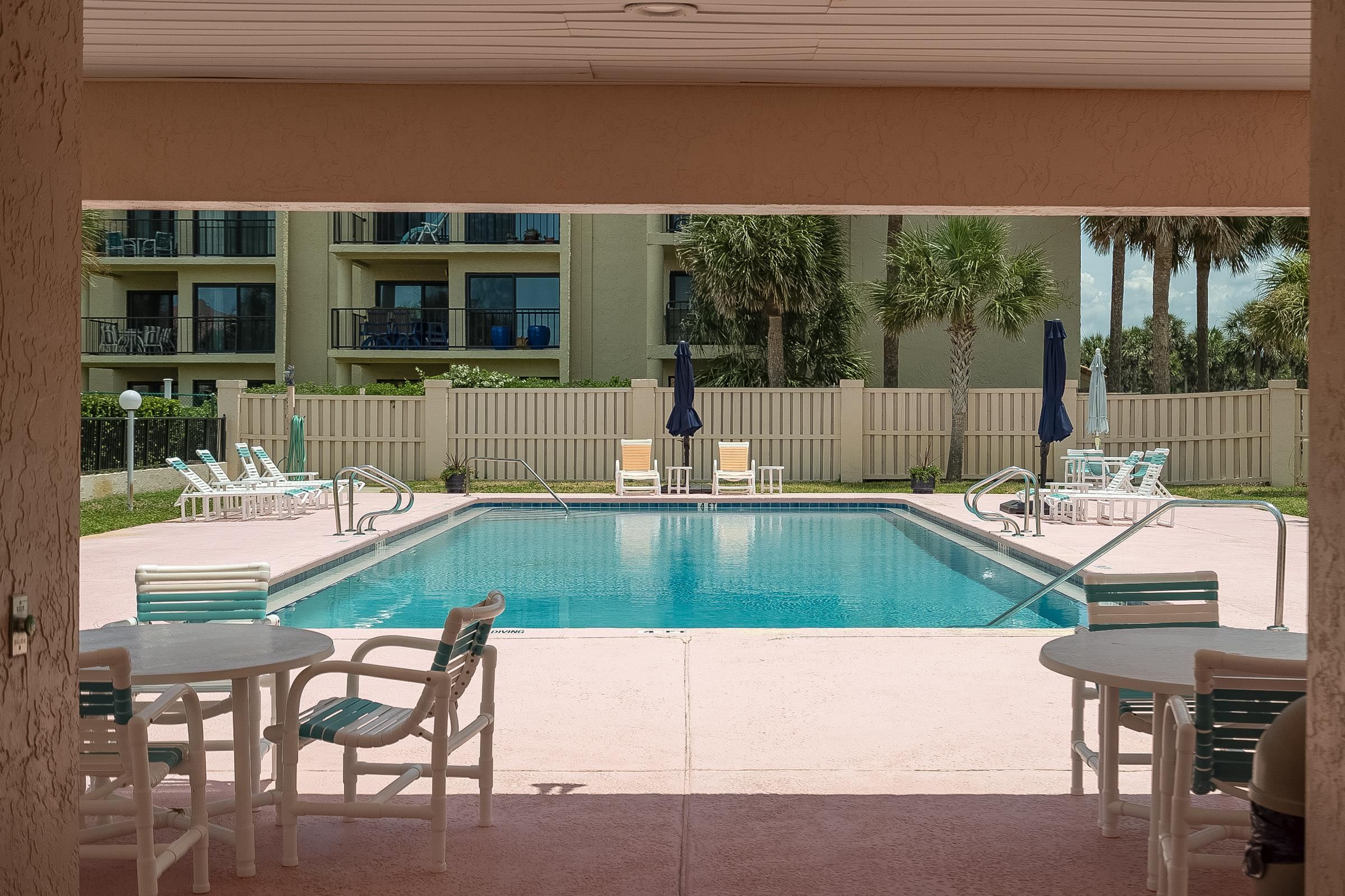 121 Tide Watch Drive St. Augustine, FL 32080 - Photo 42 of 49 a view of swimming pool with a patio