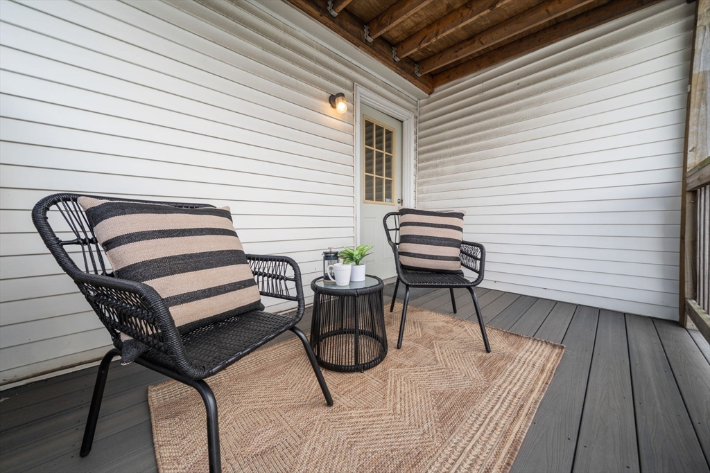 3 Glover Court, Unit 2 Boston, MA 02127 - Photo 23 of 27 a view of a chairs and table in patio