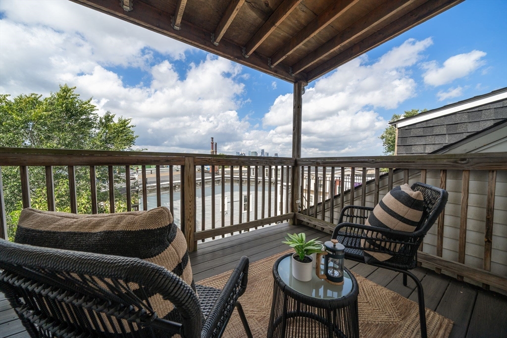 3 Glover Court, Unit 2 Boston, MA 02127 - Photo 24 of 27 a view of a balcony with chairs and a table