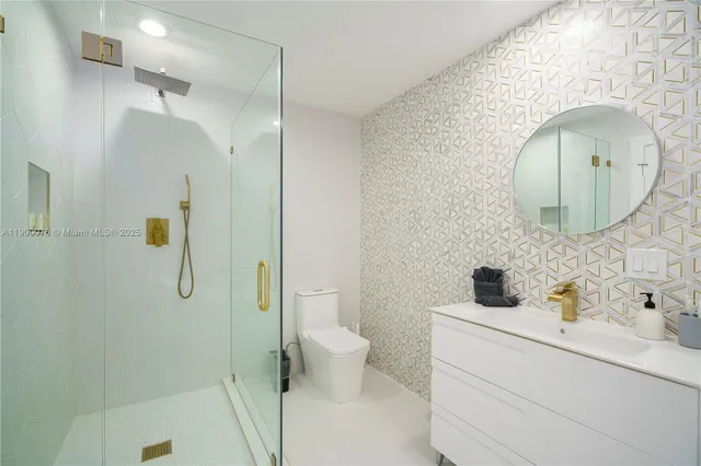 an aerial view of a house with swimming pool patio and outdoor seating