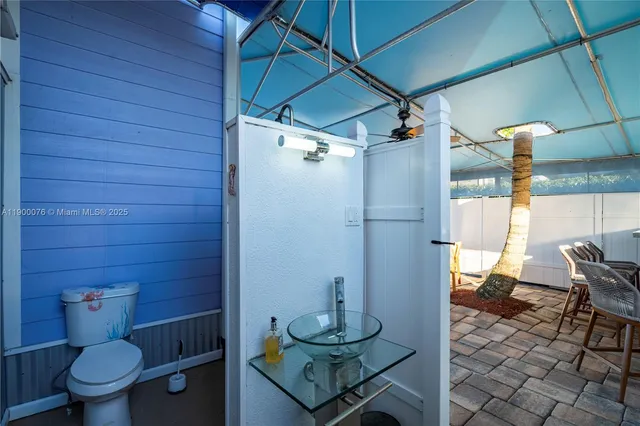 an aerial view of a house with a lake view