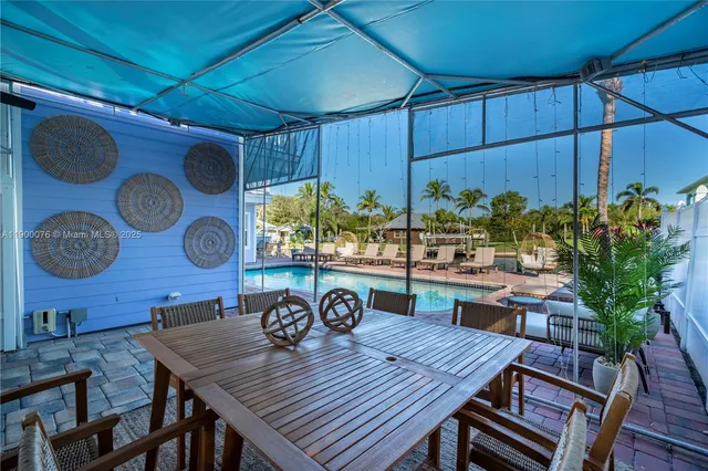 an aerial view of a house with a ocean view