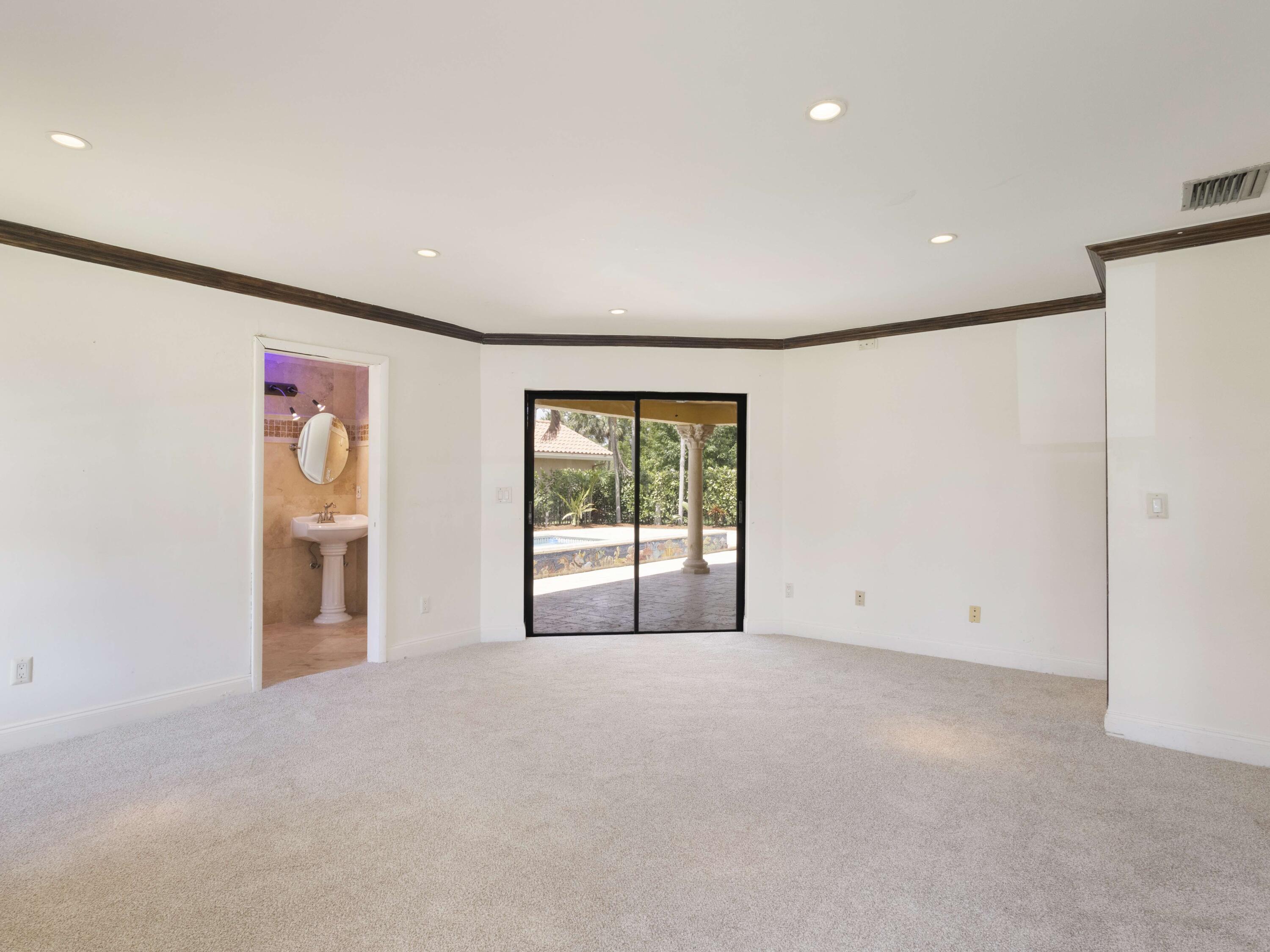 21130 White Oak Avenue Boca Raton, FL 33428 - Photo 19 of 38 a view of an empty room with a window