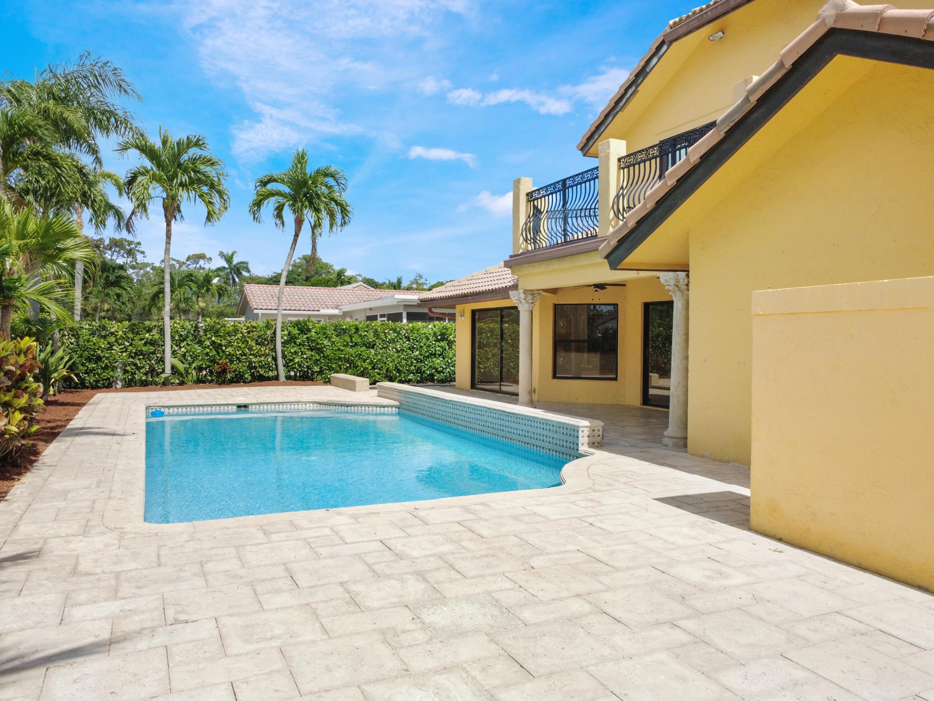 21130 White Oak Avenue Boca Raton, FL 33428 - Photo 23 of 38 a view of swimming pool with outdoor seating and plants