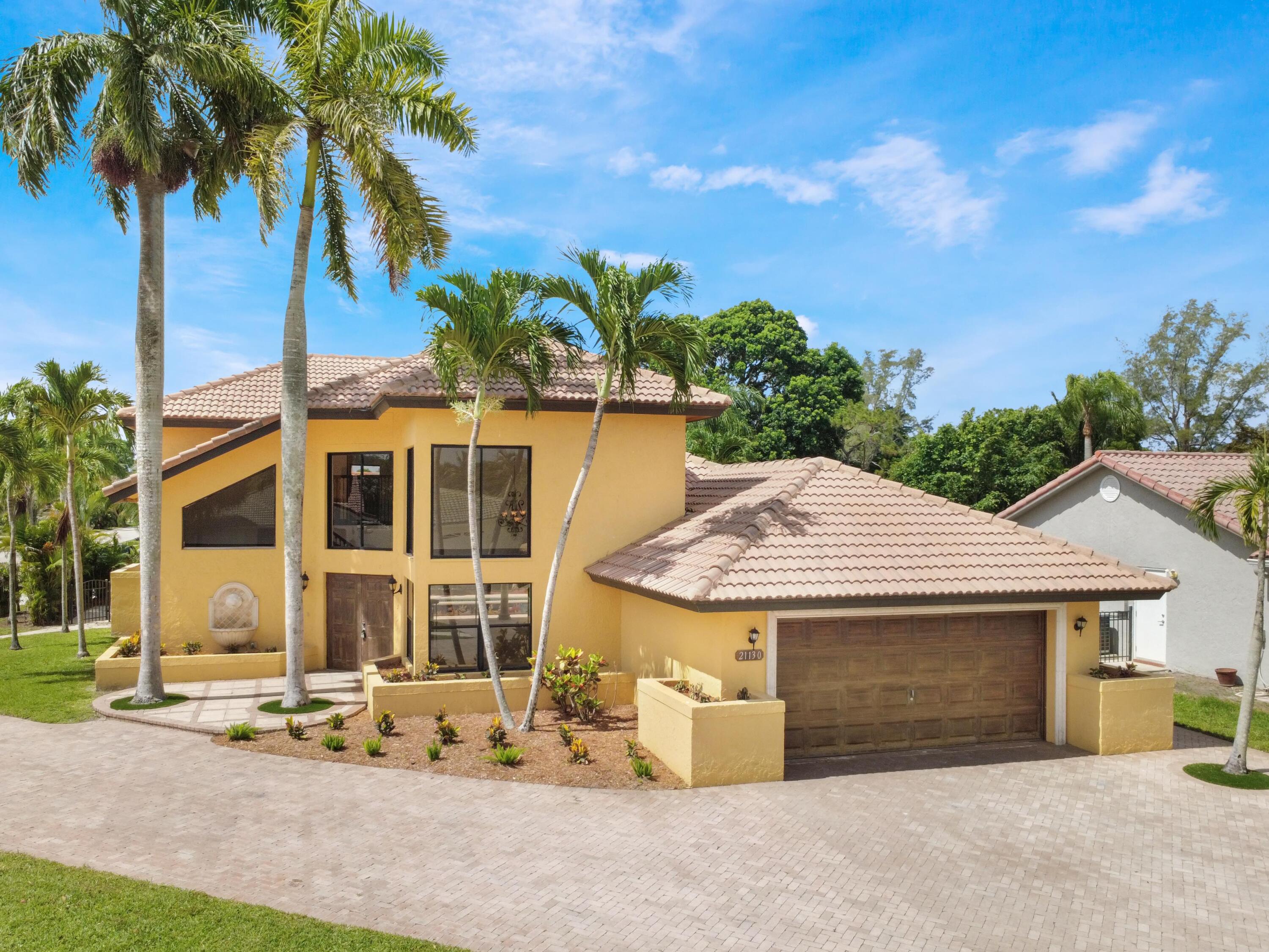 21130 White Oak Avenue Boca Raton, FL 33428 - Photo 3 of 38 a view of a house with a patio