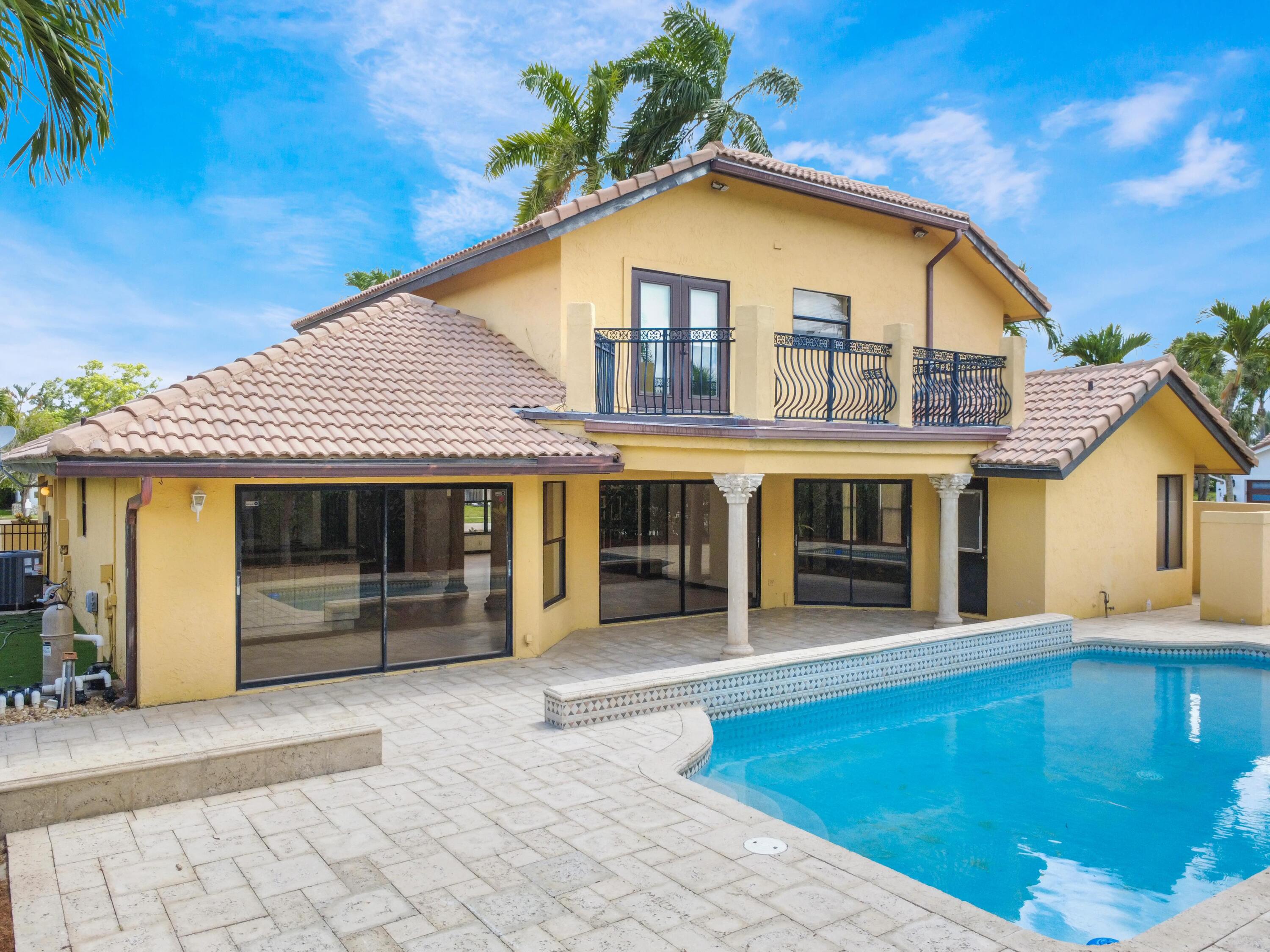 21130 White Oak Avenue Boca Raton, FL 33428 - Photo 38 of 38 a front view of a house with a yard