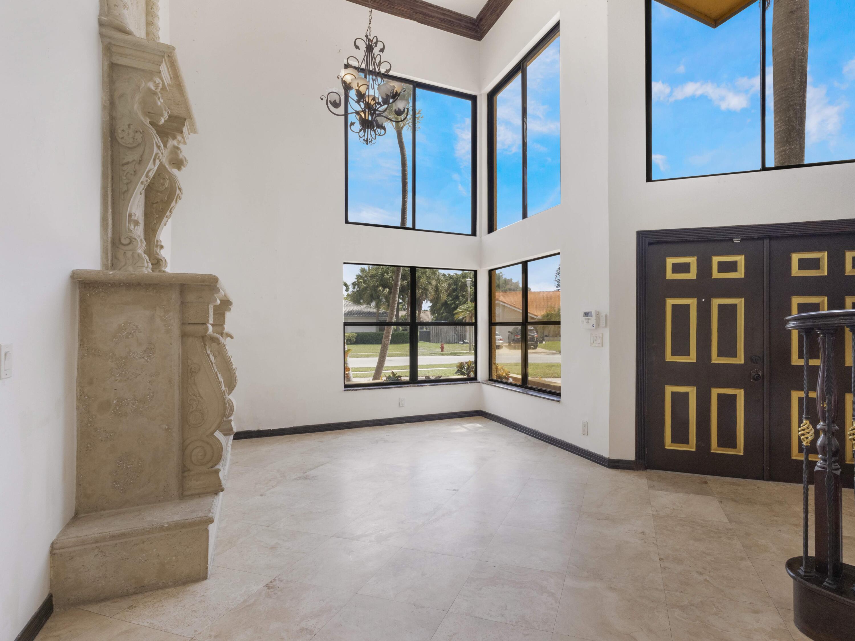 21130 White Oak Avenue Boca Raton, FL 33428 - Photo 6 of 38 a view of an empty room with a window