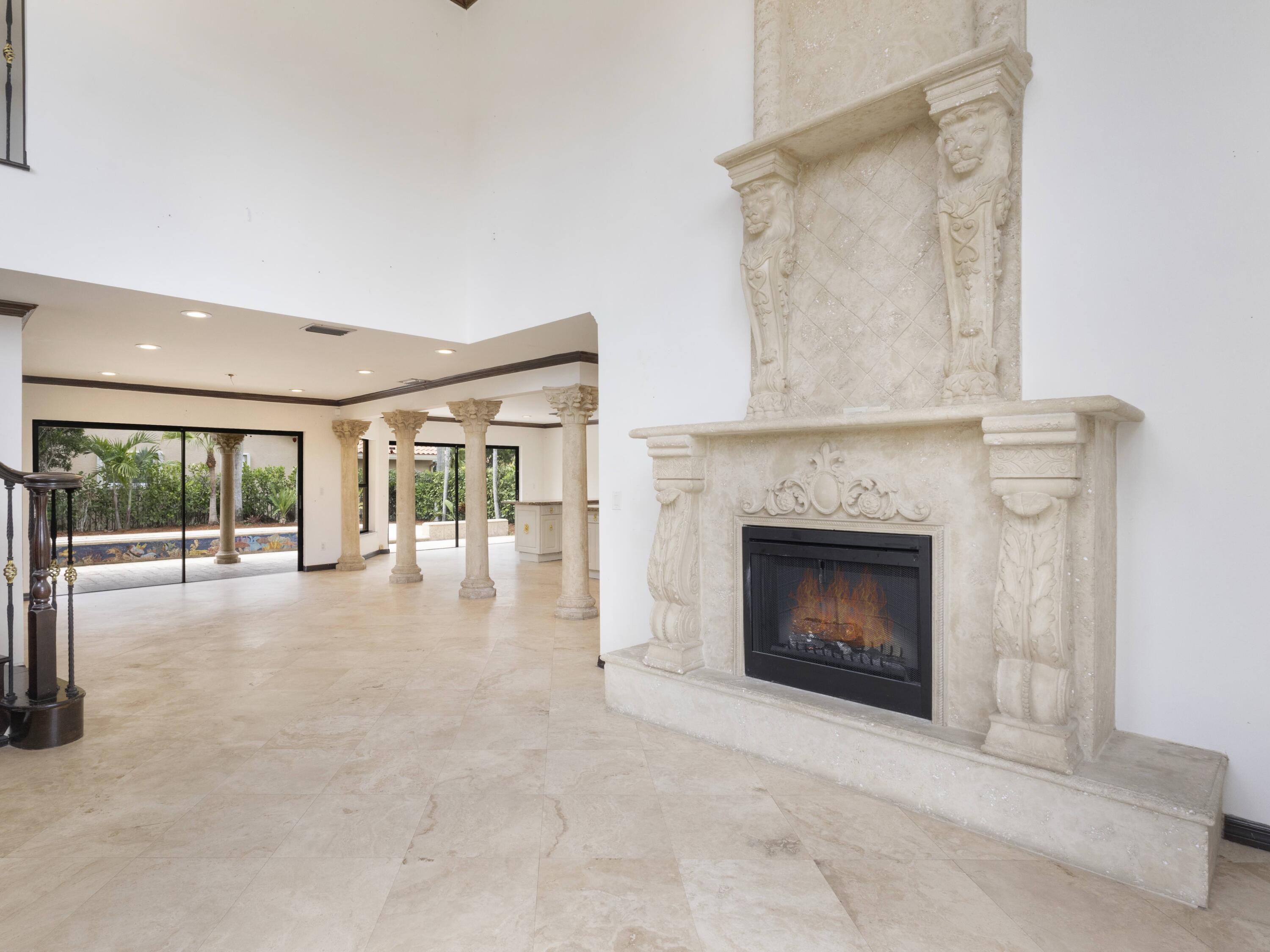 21130 White Oak Avenue Boca Raton, FL 33428 - Photo 8 of 38 a living room with furniture and a fireplace