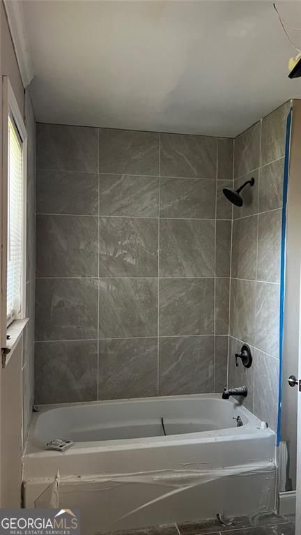 156 East Geer Street Colquitt, GA 39837 - Photo 14 of 19 a bathroom with a bathtub and shower