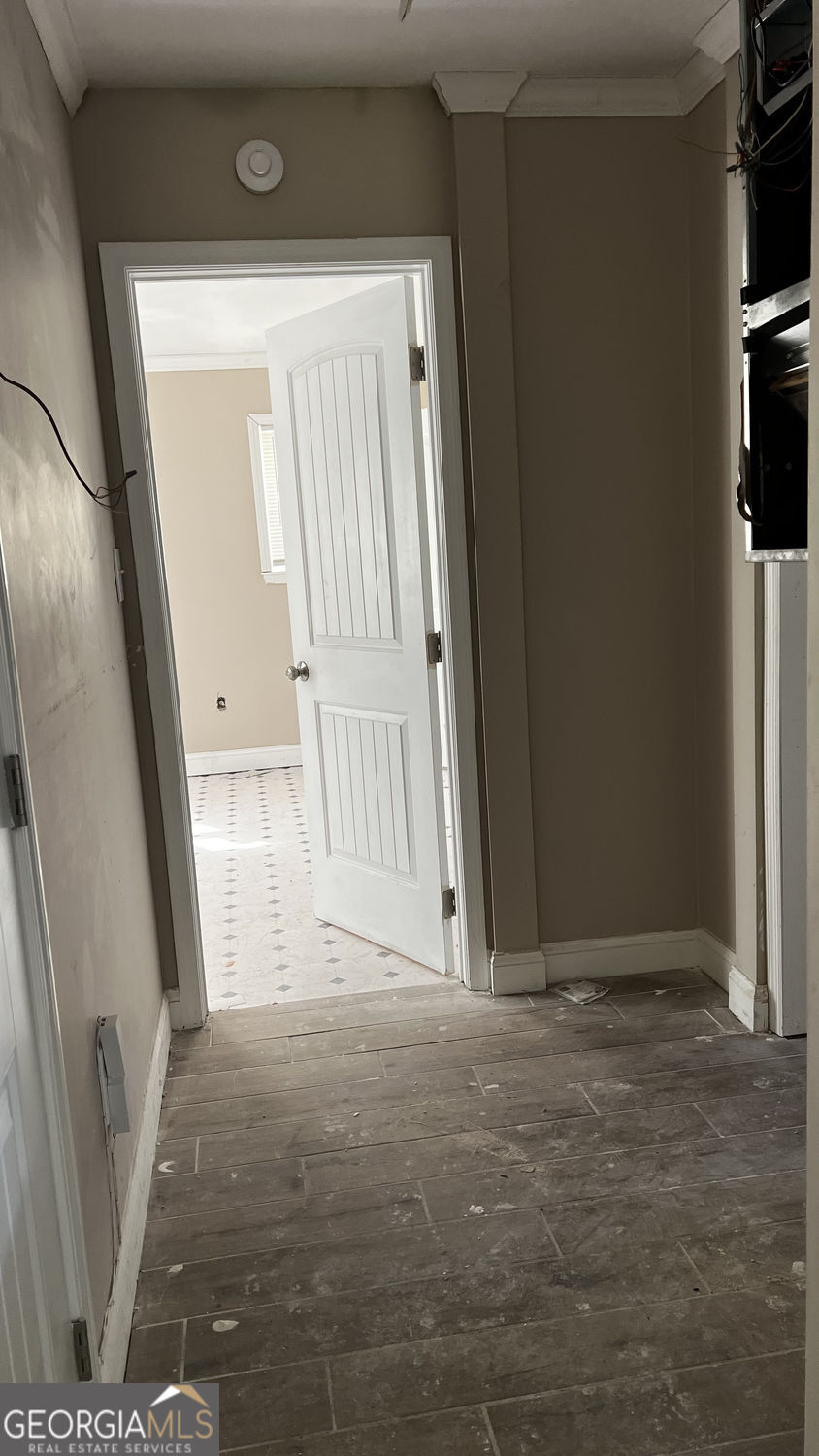156 East Geer Street Colquitt, GA 39837 - Photo 17 of 19 a view of entryway with wooden floor