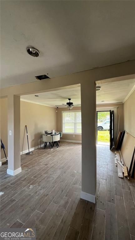 156 East Geer Street Colquitt, GA 39837 - Photo 4 of 19 a view of a livingroom with patio and a workspace